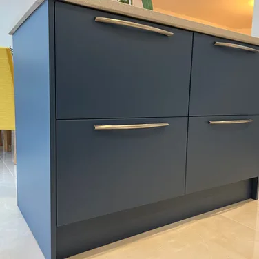 A blue kitchen island